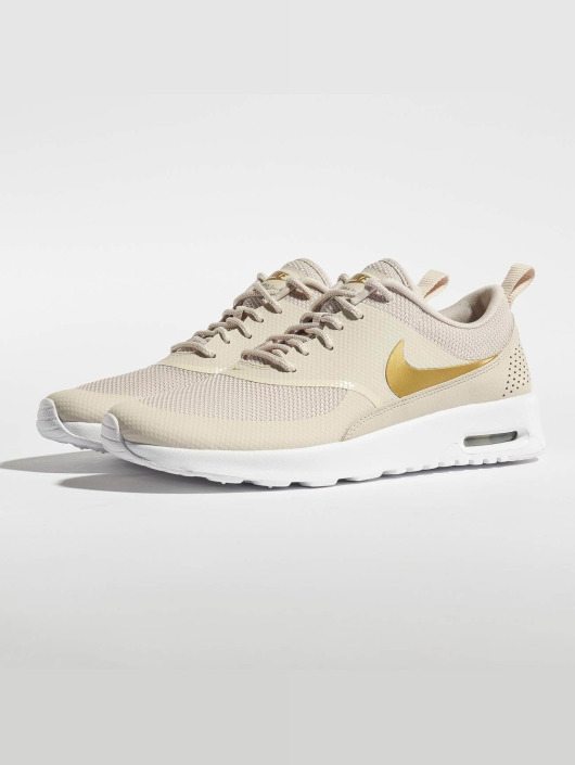 nike beige femme